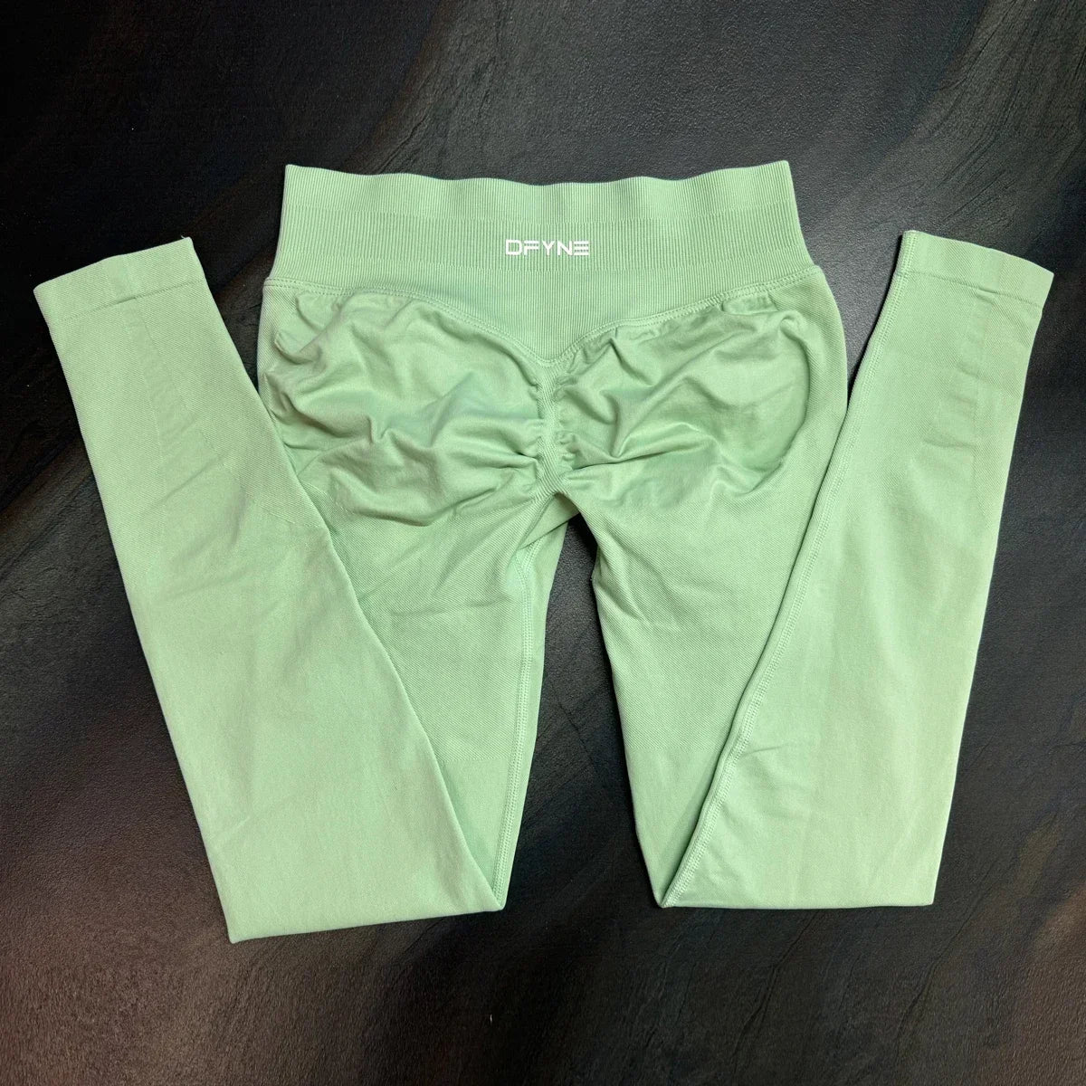 Women’s ankle-length workout leggings in Pistachio color