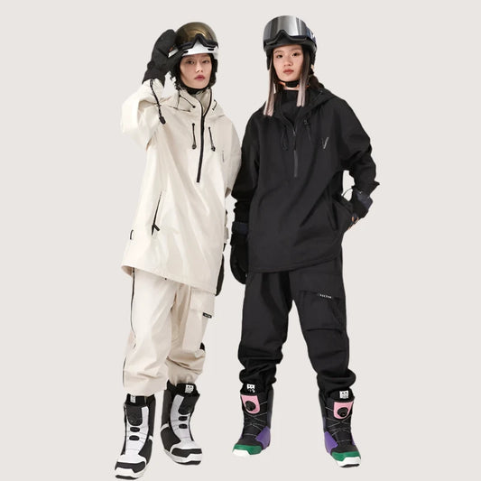 Men and women wearing a VECTOR warm ski jacket